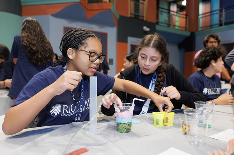 Students building reservoirs