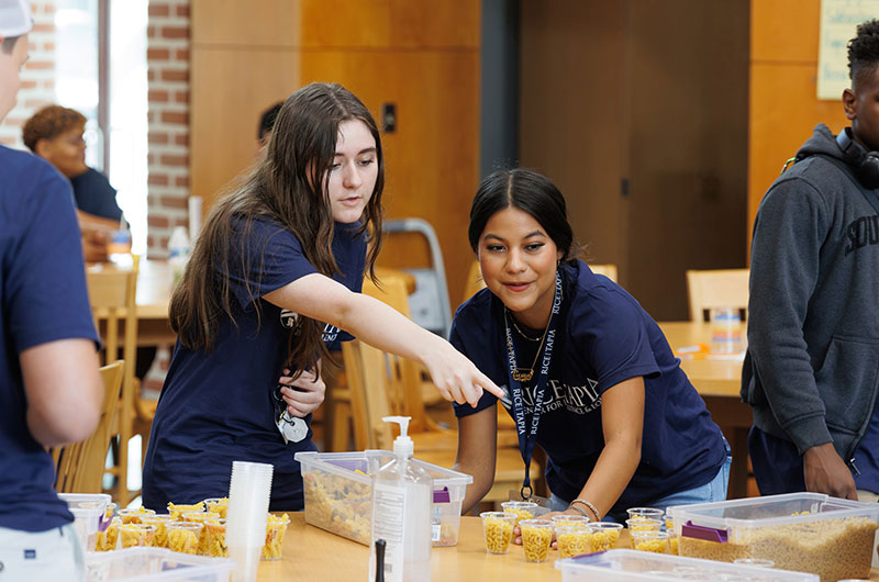 Students building reservoirs