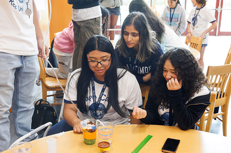 Students building reservoirs