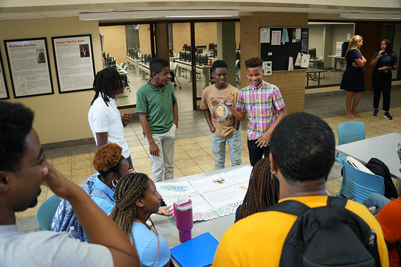 Students presenting their posters